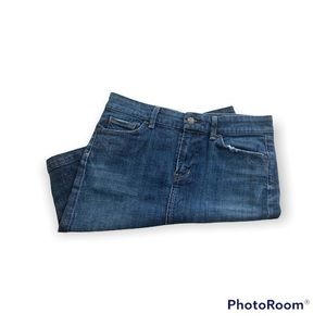 Citizens of humanity denim mini skirt with back slit.